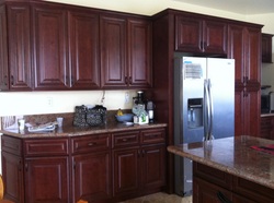 Mahogany Maple cabinets with Rose Lady counter top